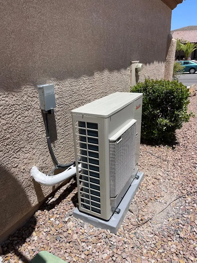 Residential air conditioning condenser unit in Hampden