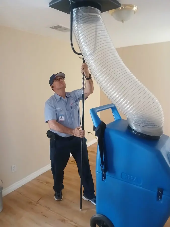 HVAC Installation technician using HEPA equipment in Hampden